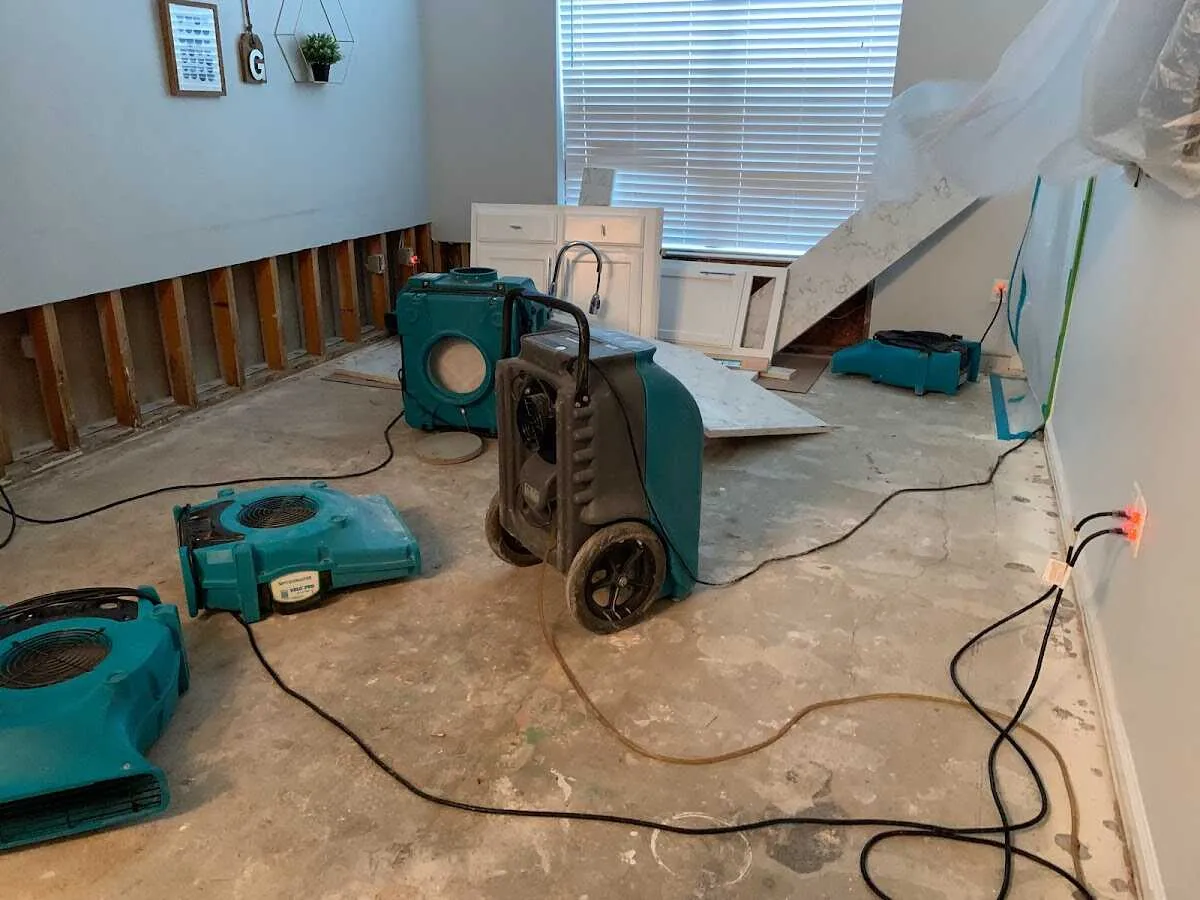 Dehumidifier in flood-cut room for Water Damage Restoration in Kerman